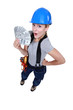 craftswoman holding bills