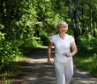 Elderly woman likes to run in the park
