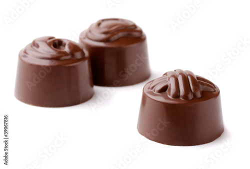 Photo: Group of three chocolate candies Group of three chocolate candies