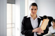 Businesswoman holding a folder