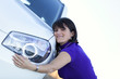 .Woman embracing her new car