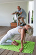 Senior citizens exercising in their home