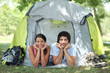 Couple lying in tent