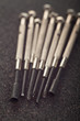 Screwdrivers on sandpaper