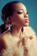 Beautiful young black woman with dark eye makeup and red lips