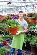 Florist man working with flowers. Florist man working with flowers.