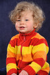 little girl in colorful cardigan little girl in colorful cardigan
