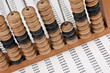 old wooden abacus on background working papers