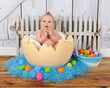Photo: adorable baby sitting in giant easter egg adorable baby sitting in giant easter egg