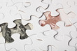 US and Euro currencies as part of a jigsaw puzzle US and Euro currencies as part of a jigsaw puzzle