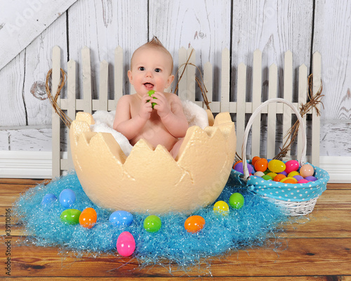 Photo: adorable baby sitting in giant easter egg adorable baby sitting in giant easter egg