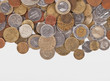 Background with different coins close-up on white background Background with different coins close-up on white background
