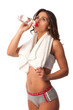 Portrait of confident young woman in sportswear holding a water Portrait of confident young woman in sportswear holding a water