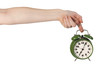 Foto: Holding alarm clock Holding alarm clock