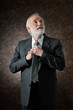 a man fixes his tie