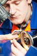 worker measuring detail worker measuring detail
