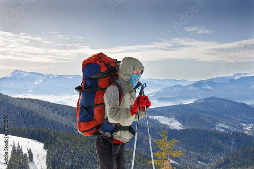 Photo: Young woman hiker hiking in Karpatian Young woman hiker hiking in Karpatian