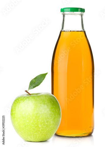 Photo: Apple juice in a glass bottle and ripe apple Apple juice in a glass bottle and ripe apple