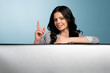 Photo: girl shows a hand sign of attention girl shows a hand sign of attention