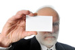 Photo: an old man keeps a white card visit an old man keeps a white card visit