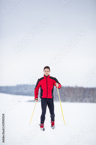 Photo: Cross-country skiing: young man cross-country skiing Cross-country skiing: young man cross-country skiing