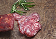 salami on wooden background salami on wooden background