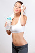 Photo: pretty young woman sweating after workout pretty young woman sweating after workout