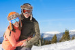 Skiers smile for the camera Skiers smile for the camera