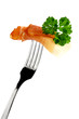 Delicious rolled smoked ham with parsley on fork