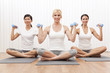 Interracial Yoga Group of Three Women Weight Training Interracial Yoga Group of Three Women Weight Training