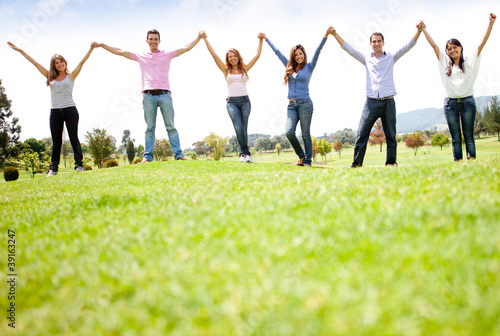 Photo: People holding hands People holding hands