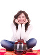 Beautiful young woman with helmet on white background
