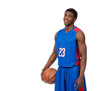 A young African American basektball player in uniform