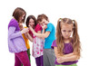Group of kids bullying their colleague