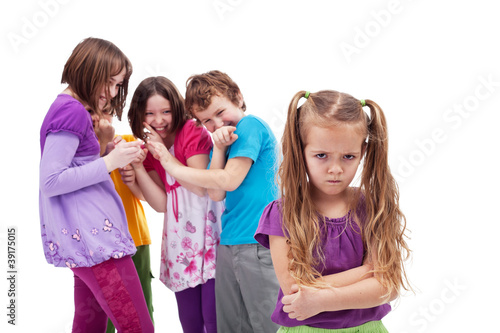 Foto: Group of kids bullying their colleague Group of kids bullying their colleague