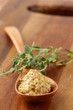 French mustard sauce in a wooden spoon French mustard sauce in a wooden spoon