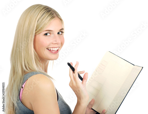Photo: portrait of cute girl holding diary portrait of cute girl holding diary