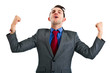 Victorious businessman with raised arms