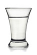 Small shot glass filled with  alcohol