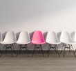 Pink plastic 60s vintage chair on wood floor