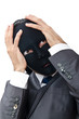 Industrial espionage concept with masked businessman
