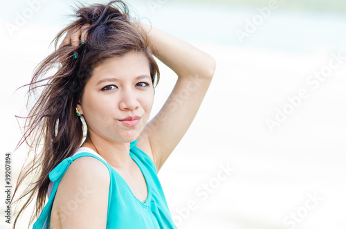 Photo: Attractive Asian woman enjoy on the beach Attractive Asian woman enjoy on the beach