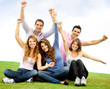 Happy group with arms up