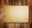 Old paper on the wood background