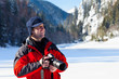 Professional photographer in the winter landscape Professional photographer in the winter landscape