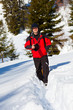 Professional photographer in the winter landscape Professional photographer in the winter landscape