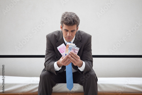 Photo: Businessman having money problems Businessman having money problems