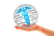 Hand holding a Caduceus Sphere
