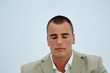 Young manager meditating during pause at work