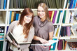 young student girl study with books in library